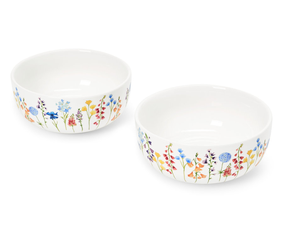 Deux bols blancs à motifs floraux.