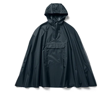 Poncho de pluie bleu pour enfant avec capuche et poche.