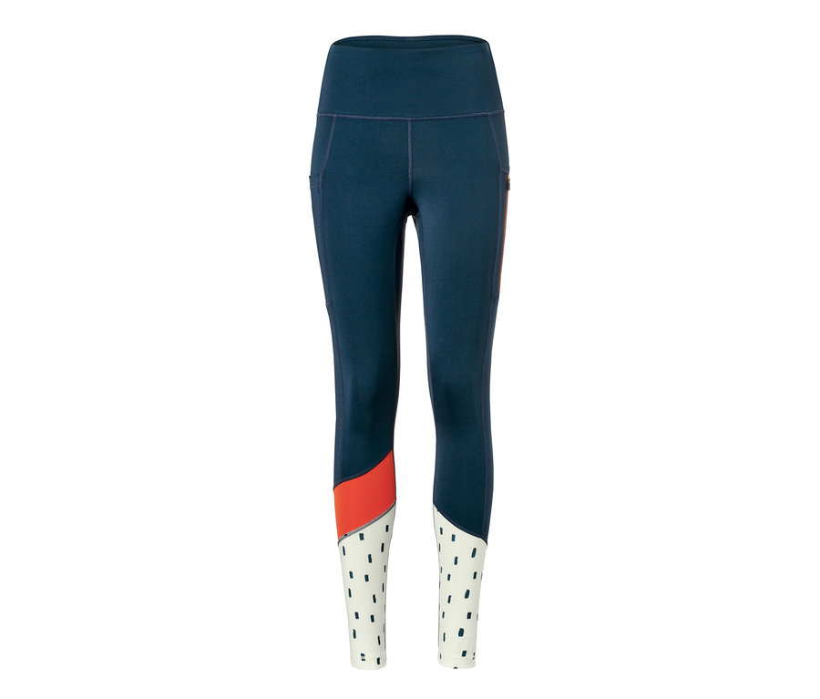 Legging de sport bleu marine, orange et blanc avec un motif à pois.