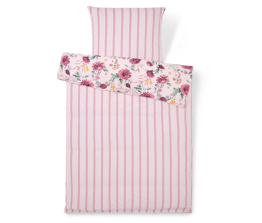 Linge de lit à rayures roses et motif floral.