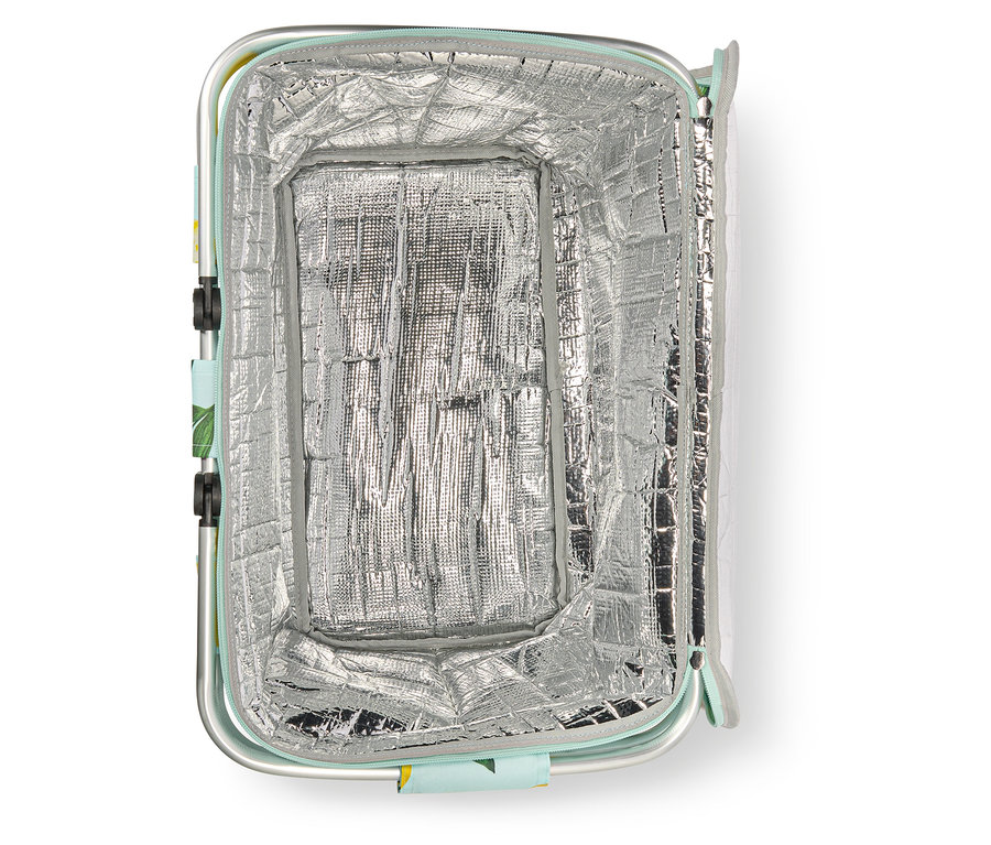 Vue intérieure d'un sac isotherme ouvert avec isolation argentée et fermeture éclair bleu clair.