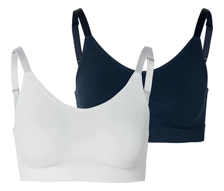 Deux soutiens-gorge, un blanc et un bleu marine, sur fond blanc.