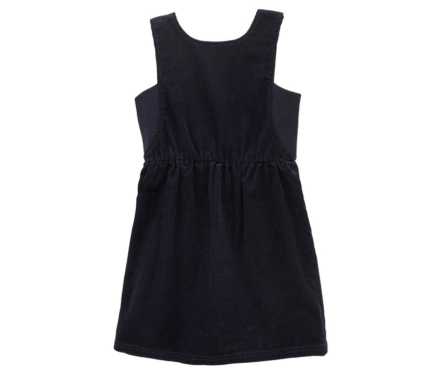 Robe salopette en velours côtelé bleu foncé, vue de dos, avec un décolleté en U, de larges bretelles et une taille élastiquée.