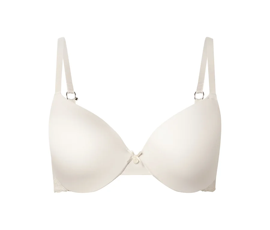 Soutien-gorge couleur ivoire à armatures et bretelles réglables, centré sur un fond blanc.