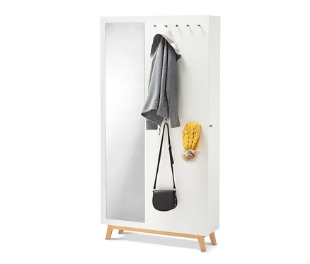 Meuble d'entrée multifonctionnel blanc avec miroir, veste, sac à main et bonnet.