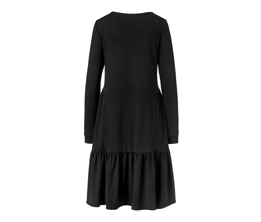Robe molletonnée noire à volant.