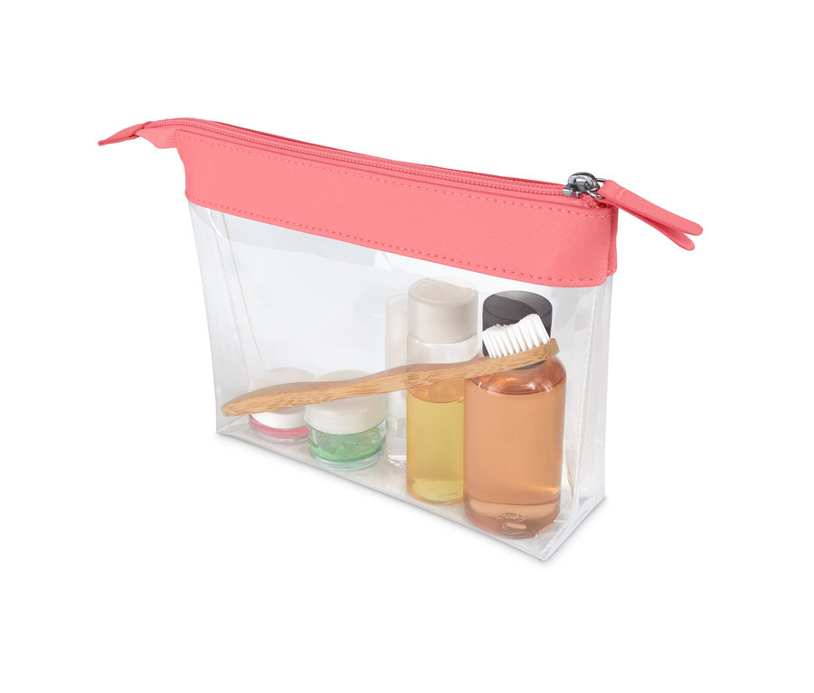 Une trousse à cosmétiques transparente pour bagage à main avec une fermeture éclair rose et son contenu.