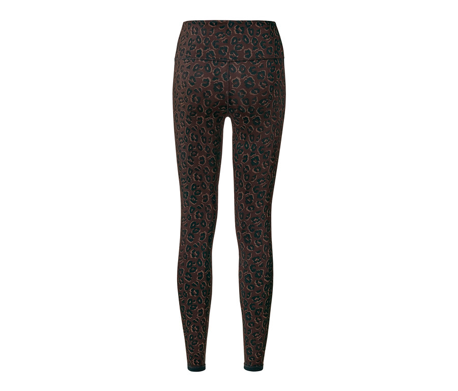 Détail d'un legging de sport réversible pour femme, noir et marron avec un motif léopard.