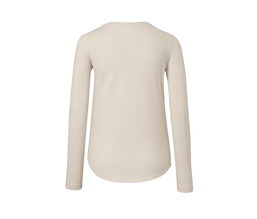 Vue détaillée de l'arrière d'un t-shirt de sport à manches longues blanc cassé.
