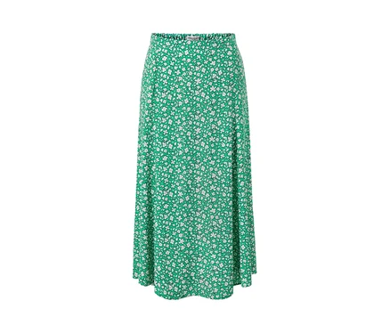 Une jupe midi verte imprimée de petites fleurs blanches.