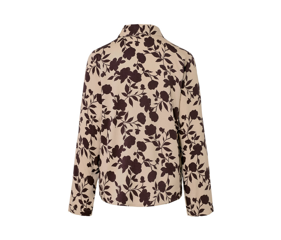 Vue détaillée d'un chemisier à imprimé intégral.