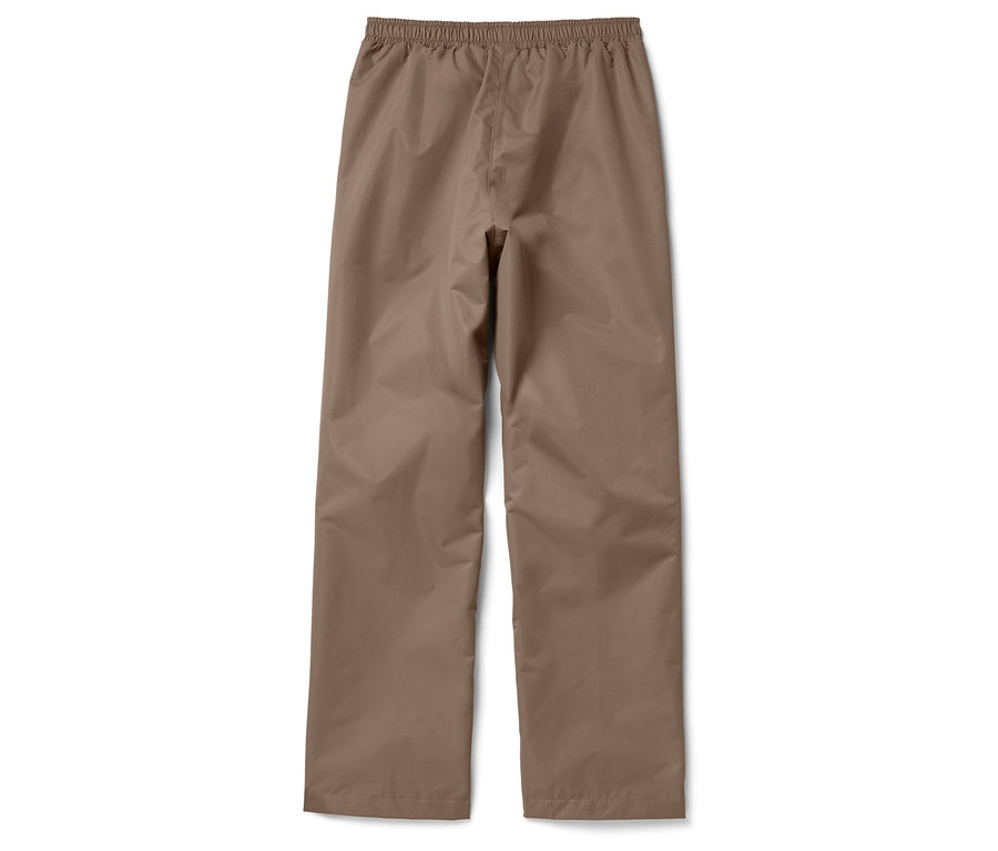 Un pantalon de pluie marron pour enfant est posé sur un fond blanc.