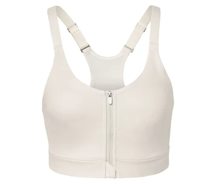Soutien-gorge de sport crème avec une fermeture éclair au milieu.