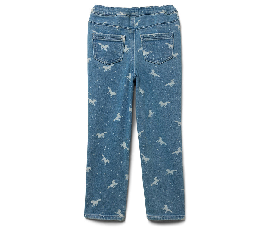 Jean bleu clair avec motif de chevaux blancs et d'étoiles, vue arrière.