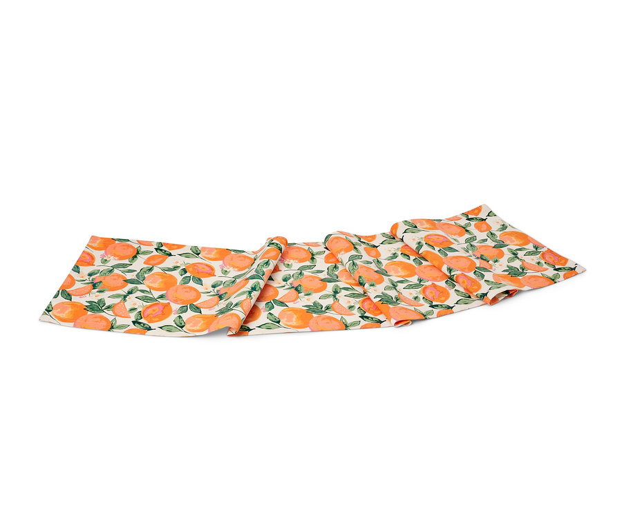 Chemin de table en coton avec motif d'oranges et de feuilles.