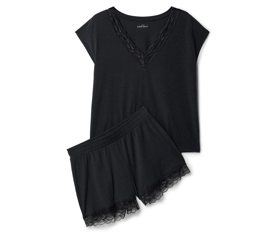 Ensemble de pyjama noir avec bordure en dentelle, composé d'un haut et d'un short.