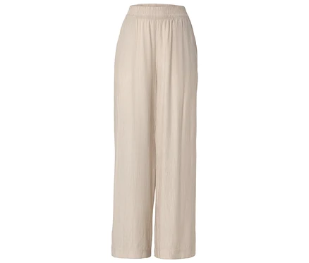 Pantalon large beige en tissu avec taille élastique.