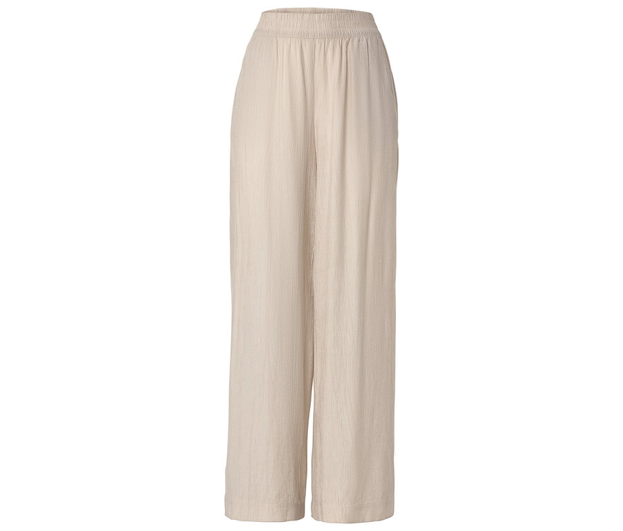 Pantalon large beige en tissu avec taille élastique.
