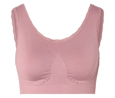 Gros plan d'un soutien-gorge rose avec des finitions en dentelle.