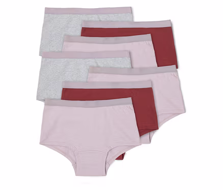 Six culottes en coton gris, rose et bordeaux sont superposées, toutes avec une ceinture grise.