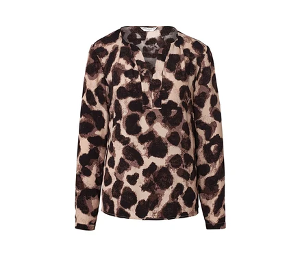 Une blouse imprimée avec un décolleté en V profond et des manches longues.