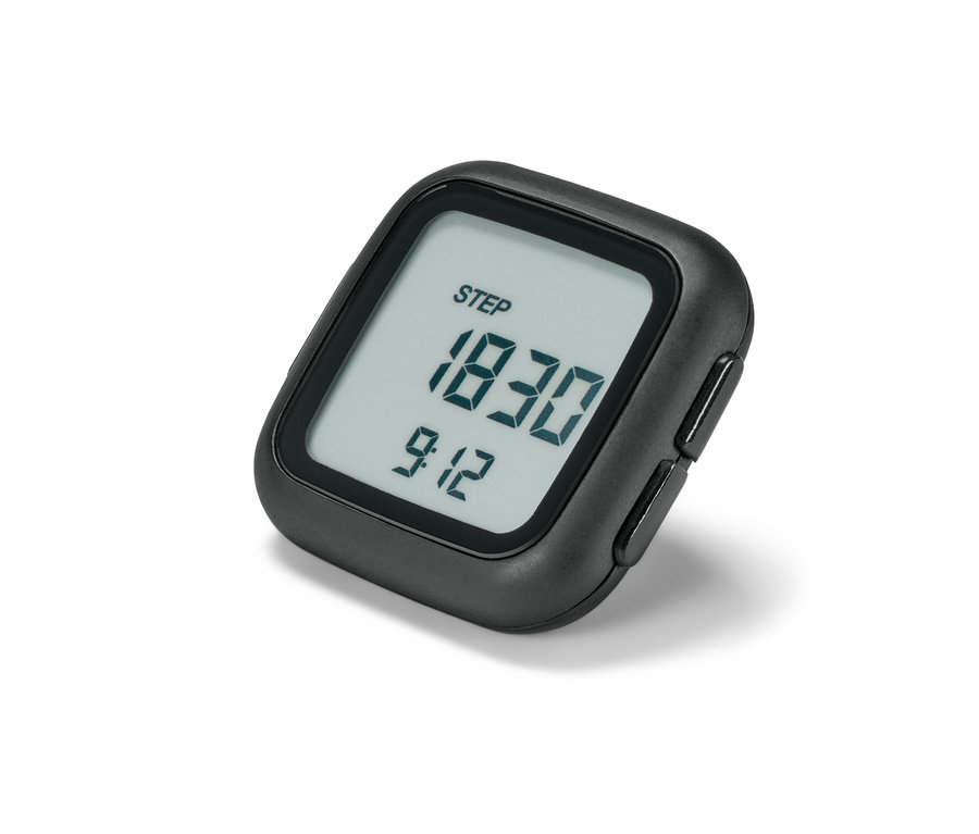 Un podomètre noir affiche des chiffres sur un fond blanc.