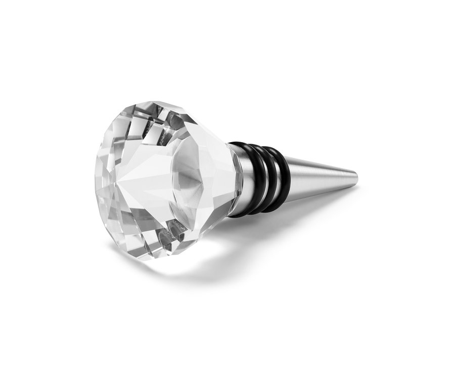 Un bouchon de bouteille est posé sur la table.