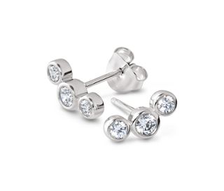 Puces d’oreille avec arc en zircons en argent 925