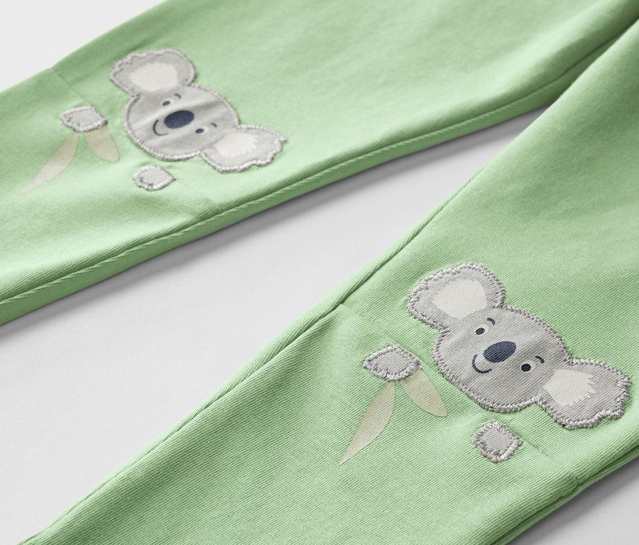 Deux leggings pour enfants avec motif koala et glace.
