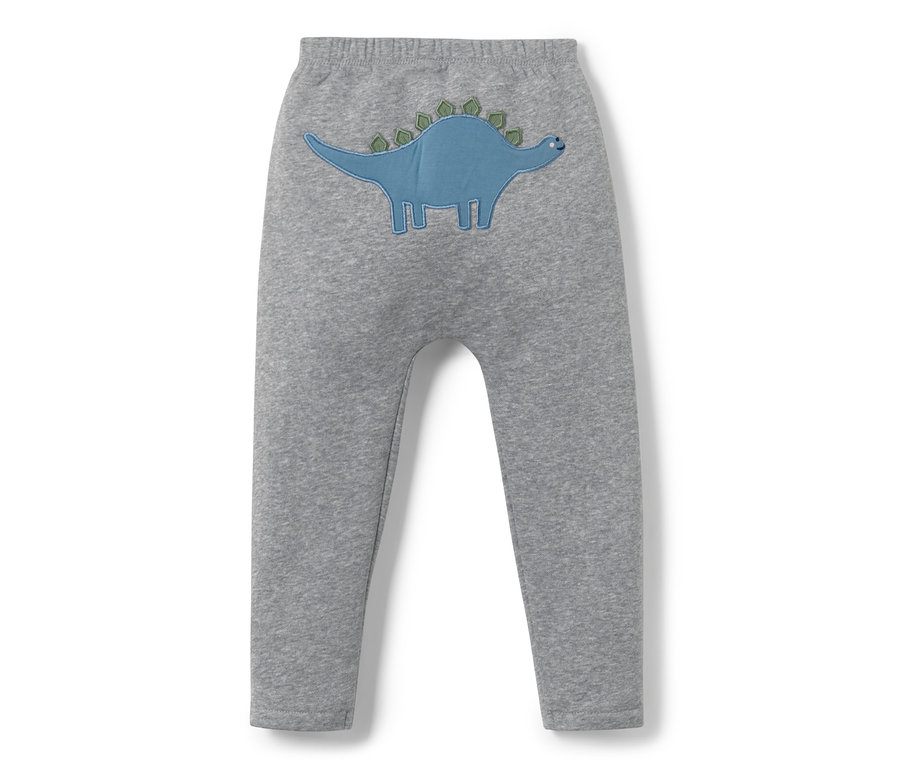 Pantalon de survêtement gris pour bébé avec un motif de dinosaure bleu.