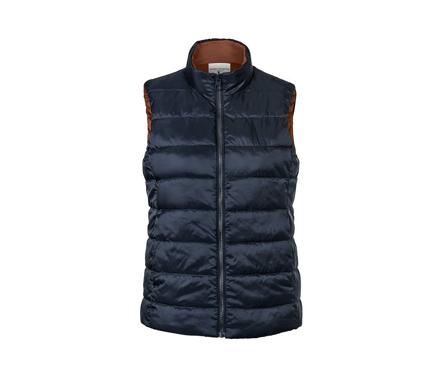 Un gilet matelassé réversible bleu marine avec un intérieur marron.