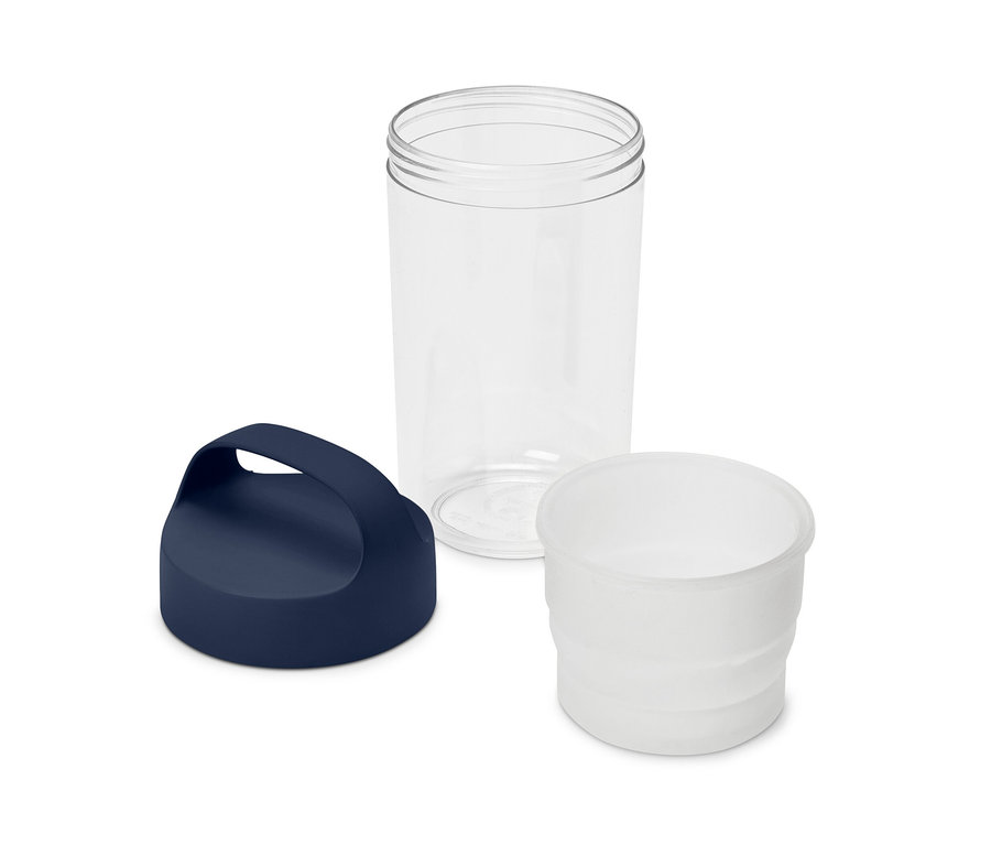 Une bouteille transparente démontée avec un couvercle bleu foncé et un insert blanc.