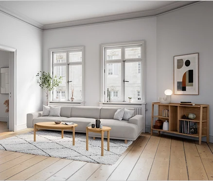 Salon avec canapé, table basse, table d'appoint ronde, buffet, commode et lampe de bureau design LED.