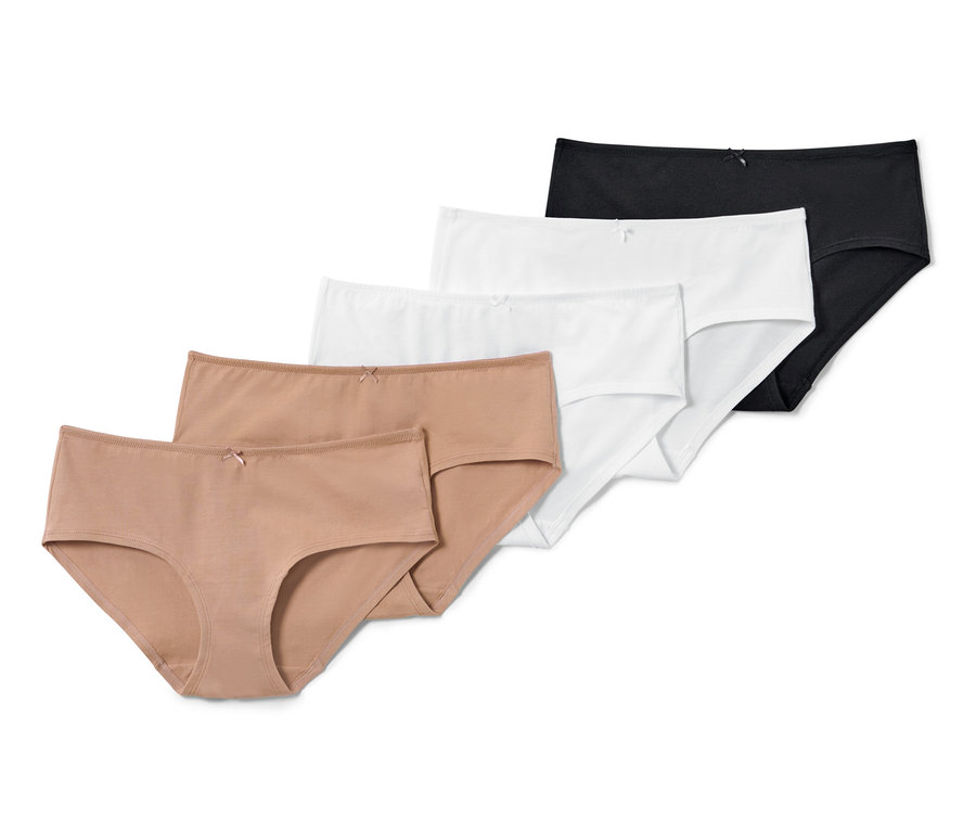 Cinq culottes beiges, blanches et noires.