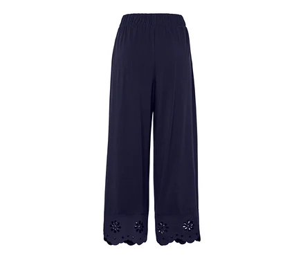 Culotte bleu marine avec broderie à l'ourlet.