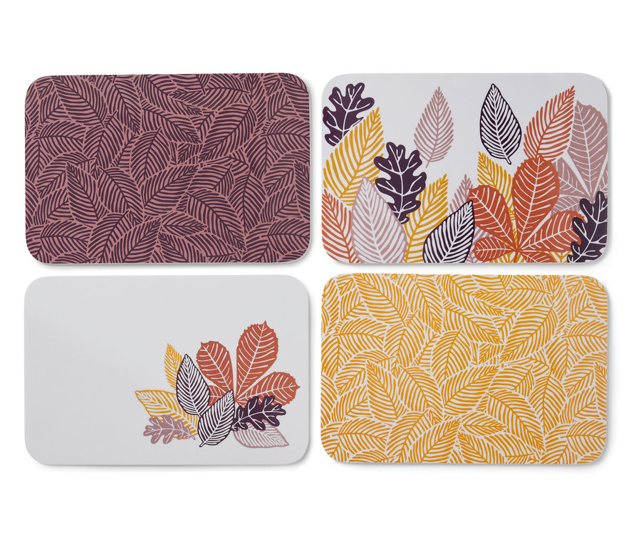 Quatre sets de table rectangulaires avec différents motifs de feuilles.