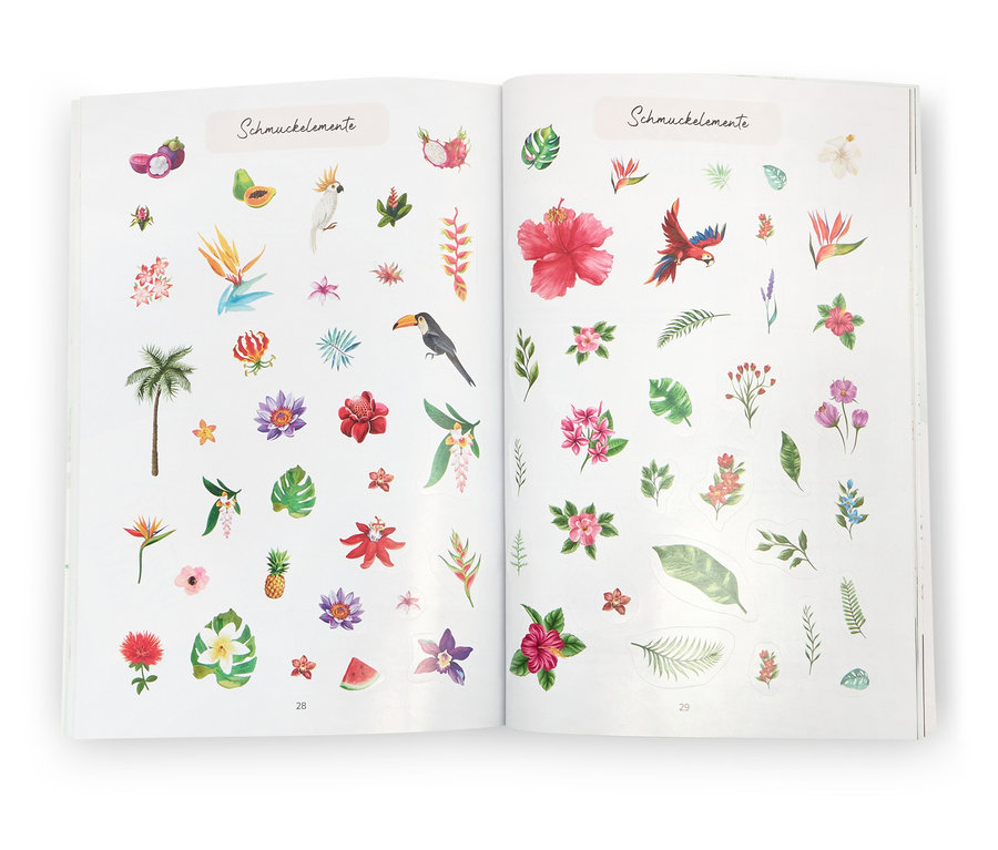 Livre ouvert « Stickerträume » (en allemand) avec des autocollants tropicaux.