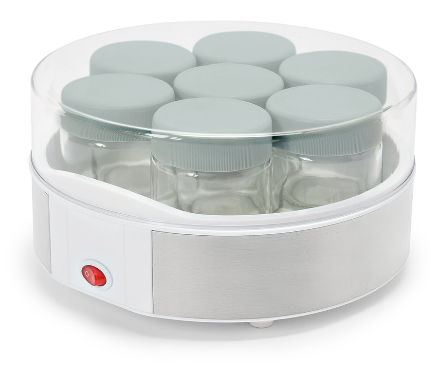 Chauffe-plat pour bébé avec plusieurs pots en verre à l'intérieur.