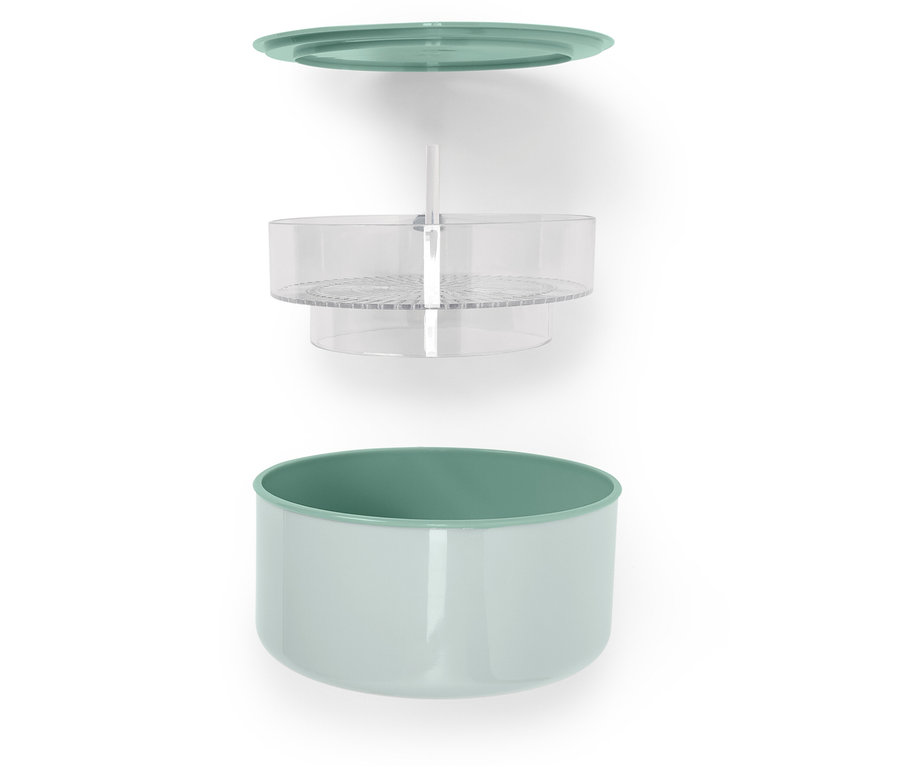 Vue éclatée d'un récipient de conservation des aliments avec un couvercle vert, un insert transparent et un récipient vert clair.
