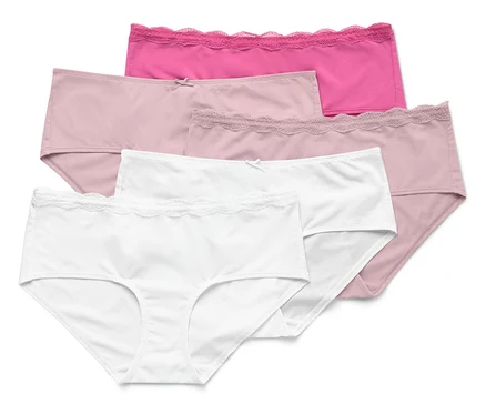 Cinq culottes en coton blanc, rose et rose disposées les unes sur les autres.