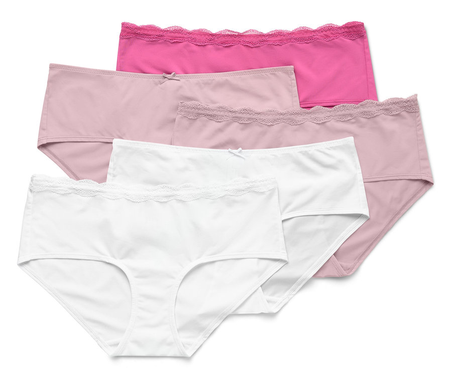Cinq culottes en coton blanc, rose et rose disposées les unes sur les autres.
