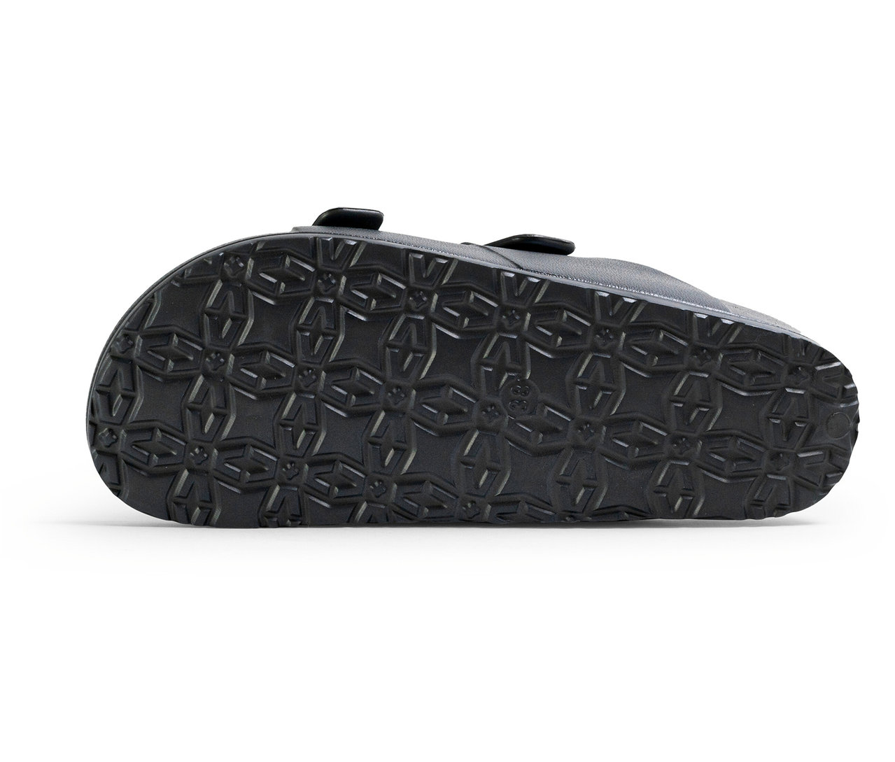 Semelle de la mule pour femme FILA Matero en noir avec un motif de croix et de carrés.