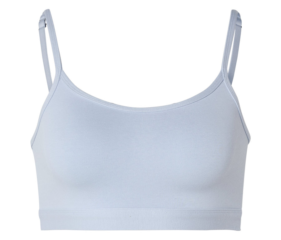 Soutien-gorge de sport bleu clair avec de fines bretelles et des boucles réglables, vue de face.