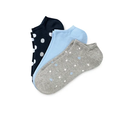 Trois paires de socquettes de sport : bleu marine à pois blancs, bleu clair et gris à pois bleus.