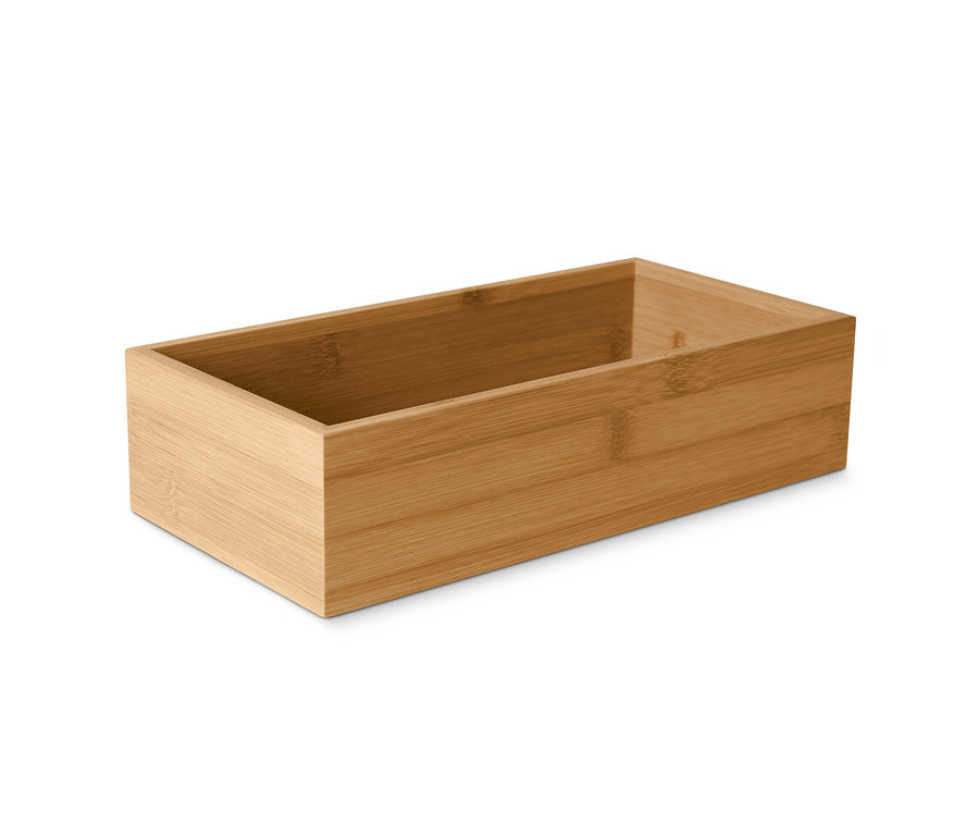 Gros plan d'une boîte à condiments vide en bambou.