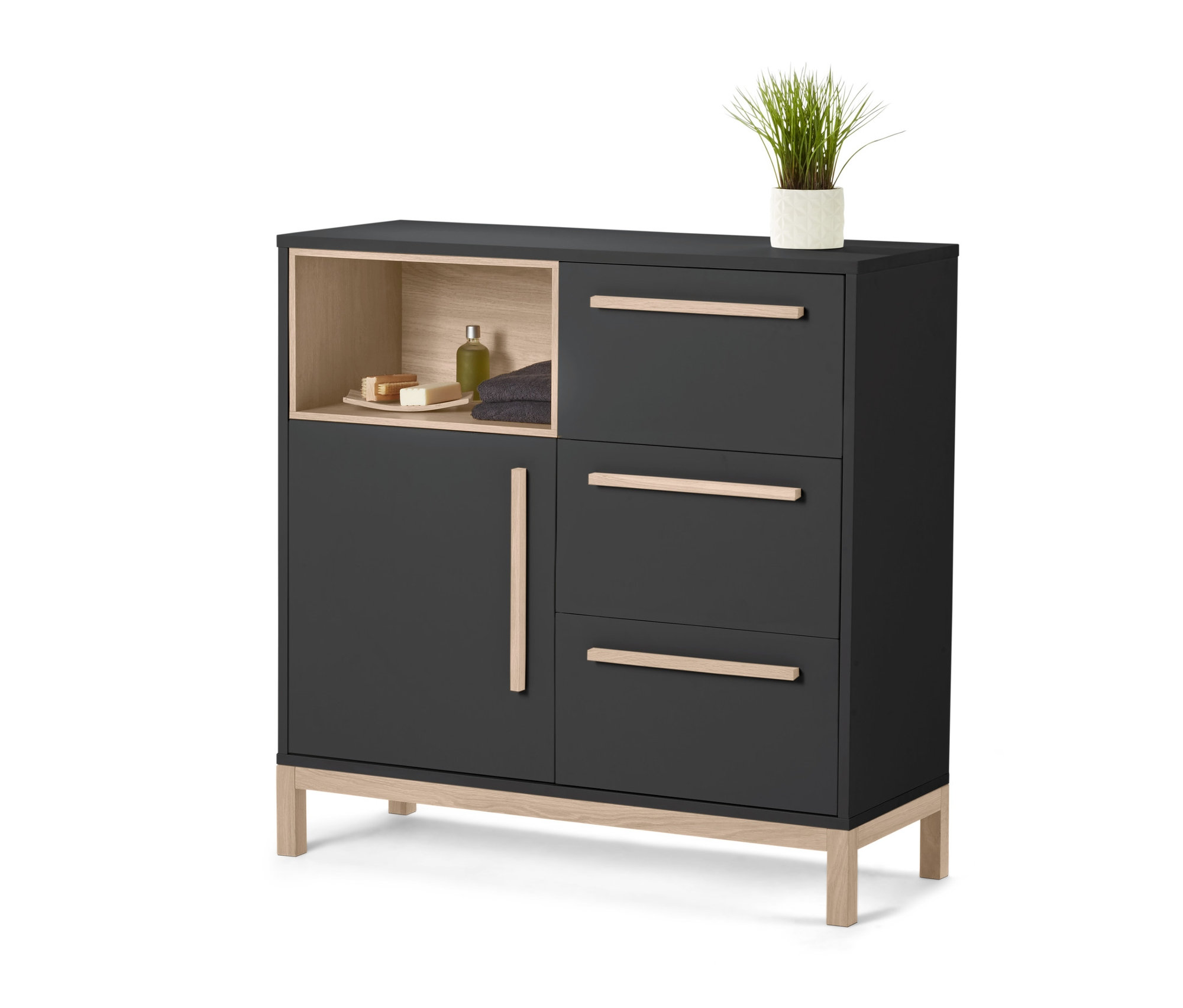 Un meuble de rangement de salle de bain anthracite Eklund avec une étagère ouverte, une porte, trois tiroirs et une plante en pot sur le dessus.