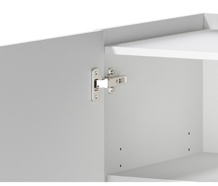 Gros plan d'une armoire blanche avec des charnières.