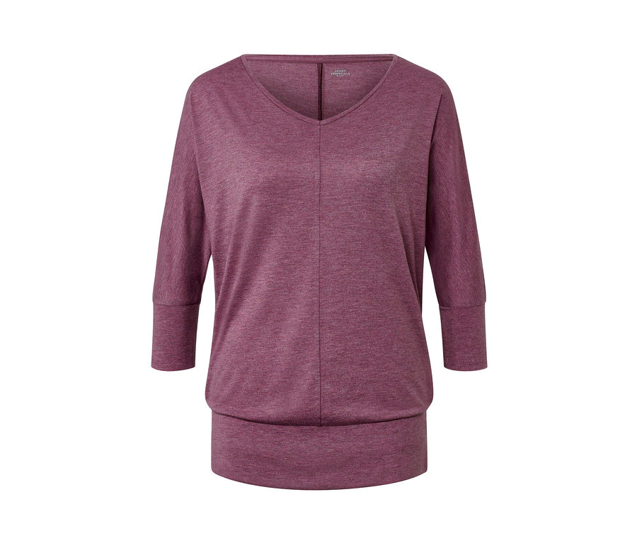 Chemise de yoga mauve à manches trois-quarts.