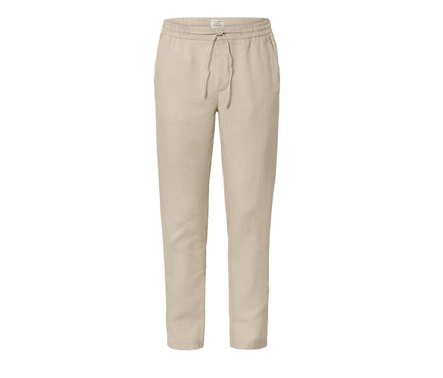 Pantalon chino en lin beige.