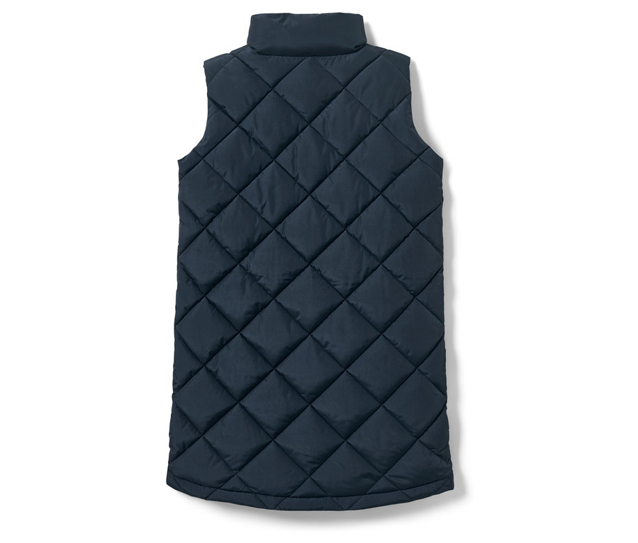 Une veste matelassée longue pour enfant, de couleur bleu marine.